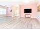 Spacious living area with light gray vinyl flooring and pink accent wall at 200 Victoria Cir, York, SC 29745