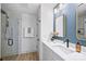 Modern bathroom with a frameless shower and double vanity at 2019 Thurmond Pl # 13, Charlotte, NC 28205