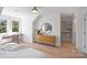 Bright bedroom featuring a built-in desk and hardwood floors at 2019 Thurmond Pl # 13, Charlotte, NC 28205