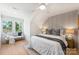 Cozy bedroom with light walls and a ceiling fan at 2019 Thurmond Pl # 13, Charlotte, NC 28205