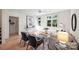 Bright living room with hardwood floors, comfortable seating, and large windows at 2019 Thurmond Pl # 13, Charlotte, NC 28205