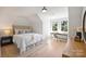 Charming bedroom with hardwood floors and a workspace at 2023 Thurmond Pl # 14, Charlotte, NC 28205