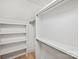 Spacious closet with shelving and hanging rods at 2023 Thurmond Pl # 14, Charlotte, NC 28205