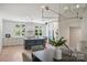 Modern kitchen with island, white cabinets, and stainless steel appliances at 2023 Thurmond Pl # 14, Charlotte, NC 28205