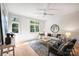Relaxing living room with hardwood floors and large windows at 2023 Thurmond Pl # 14, Charlotte, NC 28205