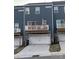Backyard of a townhome with a raised deck and attached garages at 2133 Tupelo Grove Ln, Gastonia, NC 28054