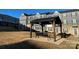 Covered community area with a grill, bench, and trash receptacle at 2133 Tupelo Grove Ln, Gastonia, NC 28054