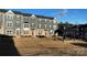 Townhome community area featuring a covered patio with a grill at 2133 Tupelo Grove Ln, Gastonia, NC 28054