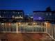Night view from deck with string lights overlooking neighborhood at 2133 Tupelo Grove Ln, Gastonia, NC 28054