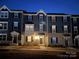Charming townhome with inviting front entrance and landscaping at 2133 Tupelo Grove Ln, Gastonia, NC 28054