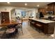 Modern kitchen with island, stainless steel appliances, and dining area at 2133 Tupelo Grove Ln, Gastonia, NC 28054