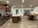 Well-equipped kitchen featuring stainless steel appliances, ample counter space, and a dining table at 2133 Tupelo Grove Ln, Gastonia, NC 28054
