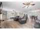 Open concept living and dining area with fireplace and updated flooring at 2654 Saddlewood Cir, Concord, NC 28027