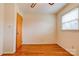 Bright bedroom with hardwood floors and window at 302 Churchill Dr, Kings Mountain, NC 28086