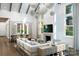 Bright living room features vaulted ceilings, a large sectional sofa, a fireplace, and plenty of natural light at 4935 Morning Mist Dr # 198, Sherrills Ford, NC 28673