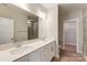 Double vanity bathroom with a large walk-in shower at 6288 Culbert St # 191, Harrisburg, NC 28075