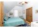 Comfortable bedroom with a brass bed frame and teal bedding at 633 Weston Acres Rd, Fort Lawn, SC 29714