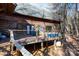Wooden deck with seating area and view of woods at 633 Weston Acres Rd, Fort Lawn, SC 29714