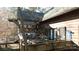 Covered deck with seating area and wooded views at 633 Weston Acres Rd, Fort Lawn, SC 29714