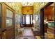 Stone entryway with wooden doors and a bench at 633 Weston Acres Rd, Fort Lawn, SC 29714