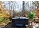 Hot tub on a deck in a wooded setting at 633 Weston Acres Rd, Fort Lawn, SC 29714