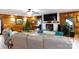 Spacious living room with a fireplace, hardwood floors, and large TV at 633 Weston Acres Rd, Fort Lawn, SC 29714