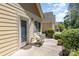 Private backyard patio with seating area and lush greenery at 7930 Tigers Paw Rd, Huntersville, NC 28078