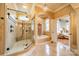 Elegant bathroom featuring a soaking tub and walk-in shower at 8215 Buena Vista Dr, Denver, NC 28037