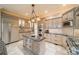 Gourmet kitchen with stainless steel appliances and granite counters at 8215 Buena Vista Dr, Denver, NC 28037