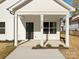 Charming front porch with black door and white columns at 920 Sycamore Ave, Gastonia, NC 28052