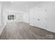 Bright and airy living room with hardwood floors and lots of natural light at 920 Sycamore Ave, Gastonia, NC 28052