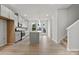 Modern kitchen with gray cabinets and a kitchen island at 1720 Blanche St, Charlotte, NC 28262