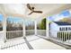 Relaxing deck with ceiling fan, overlooking wooded area at 17714 Meadow Bottom Rd, Charlotte, NC 28277