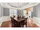 Formal dining room with chandelier and hardwood floors at 4805 Sandtyn Dr, Waxhaw, NC 28173