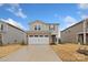 Two-story home with brick front and attached garage at 509 Olympia Way, York, SC 29745