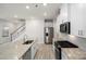 Modern kitchen with white cabinets and granite countertops at 509 Olympia Way, York, SC 29745