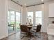 Kitchen nook with sliding glass doors leading to backyard at 6120 Barcelona Way, Charlotte, NC 28214