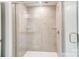 Spacious shower with glass enclosure and tiled walls at 626 Monroe St, Statesville, NC 28677