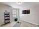 Well-lit bedroom with yoga mat and exercise ball at 8104 Downy Oak Ln, Charlotte, NC 28269