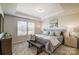 Spacious main bedroom with plush bedding and two nightstands at 8108 Downy Oak Ln, Charlotte, NC 28269