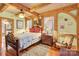 Charming bedroom with hardwood floors and a ceiling fan at 917 Patrick Johnston Ln, Davidson, NC 28036