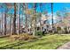 Two-story house with wraparound porch and landscaped yard at 917 Patrick Johnston Ln, Davidson, NC 28036