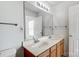 Double vanity bathroom with large mirror and ample storage at 9315 Ames Hollow Rd, Charlotte, NC 28216