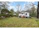 Backyard with shed and wooded area at 1009 Spann St, Shelby, NC 28150