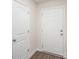 Entryway with hardwood floors and white doors at 1542 Cannan Mountain Dr, Newton, NC 28658