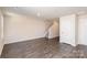 Living room with hardwood floors and staircase at 1542 Cannan Mountain Dr, Newton, NC 28658