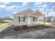 Newly constructed single-story home with a covered porch at 17 N Arlington St, Salisbury, NC 28144