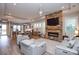 Spacious living area featuring a stone fireplace and open concept design at 2006 Gibbs Farm Dr, Monroe, NC 28110