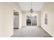 Dining area with sliding glass doors and chandelier at 2712 New Hamlin Way, Charlotte, NC 28210