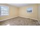 Simple bedroom with neutral walls and carpeted floor at 2809 Markland Dr, Charlotte, NC 28208